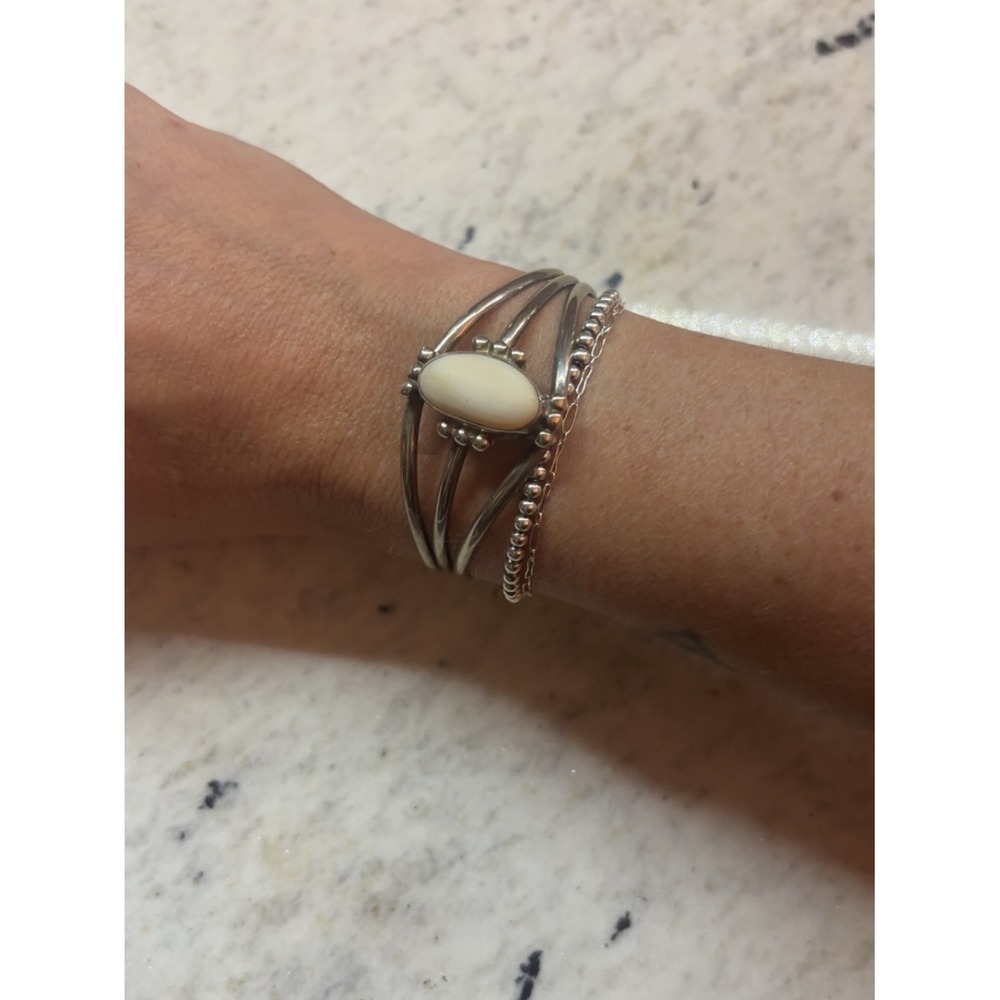 Vintage Native American sterling silver and genuine mother of pearl cuff